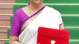 New Delhi: Union Finance Minister Nirmala Sitharaman carrying the Budget tablet poses for photos as she arrives at Parliament House to present the Union Budget 2024 in New Delhi on Tuesday July 23, 2024. (Photo: IANS/PIB)