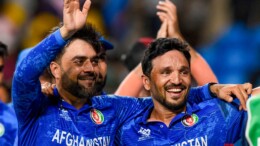 Grenadines : Afghanistan's captain Rashid Khan and teammate Gulbadin Naib celebrate after defeating Bangladesh by eight runs in their men's T20 World Cup cricket match at Arnos Vale Ground, Kingstown, Saint Vincent and the Grenadines, Tuesday, June 25, 2024. (Photo: IANS/@ICC)